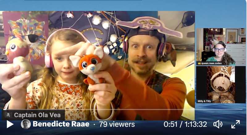 Screenshot of the Pirate Princess holding two small stuffed animals with Cap'n', Queen Raae and Milly+Tilly Cam