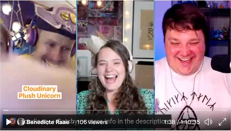 Screendump of Ola, me, and Colby laughing with a blurry plush unicorn covering Lillian's face